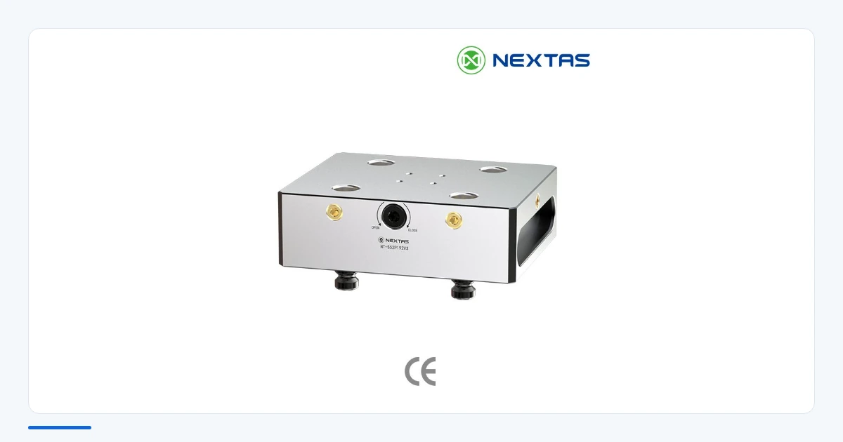 A raised rectangular manual zero-point plate with a front control and underside pull studs.
